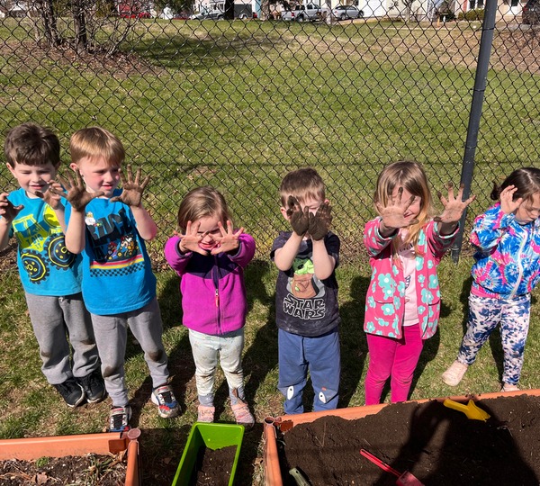 Holy Cross Early Childhood Center Manchester, NH early childhood ages 3-5 Gardening Exploring